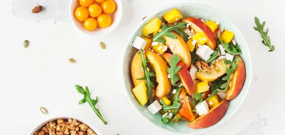 Mediterranean style meal with tuna, salad, hummus and olives photo