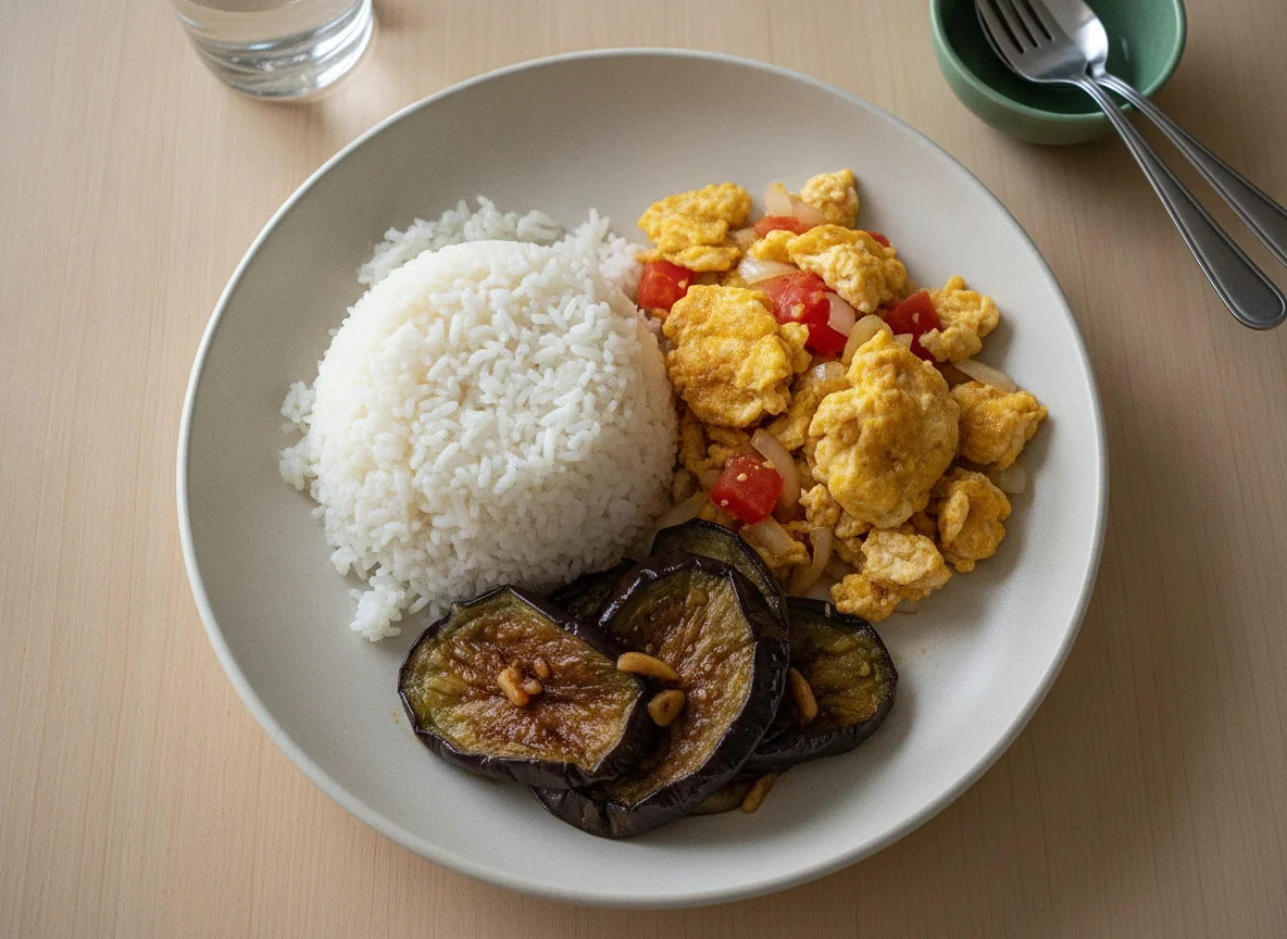 Filipino Rice Meal with Scrambled Eggs and Vegetables photo