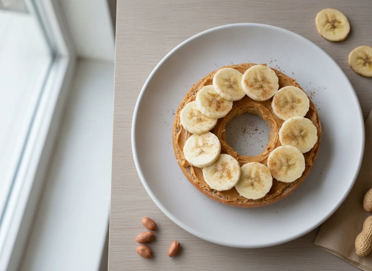 Wholemeal bagel with peanut butter and banana photo