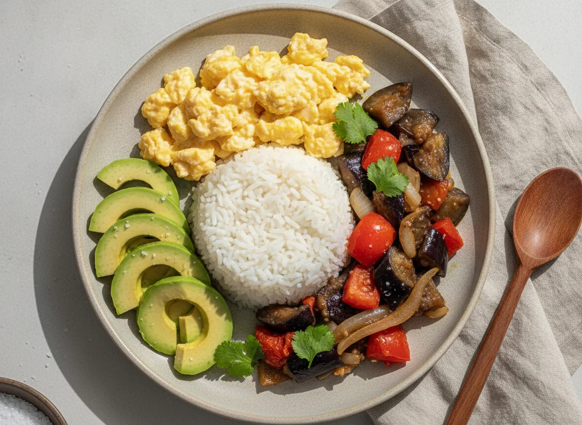 Arroz con huevos revueltos, palta y salteado de berenjenas photo