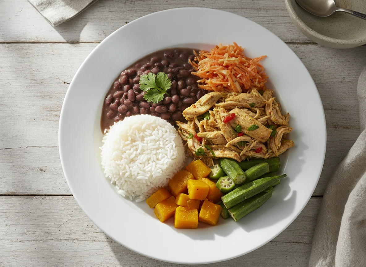 Frango desfiado com arroz, feijão, abóbora, quiabo e salada de cenoura photo